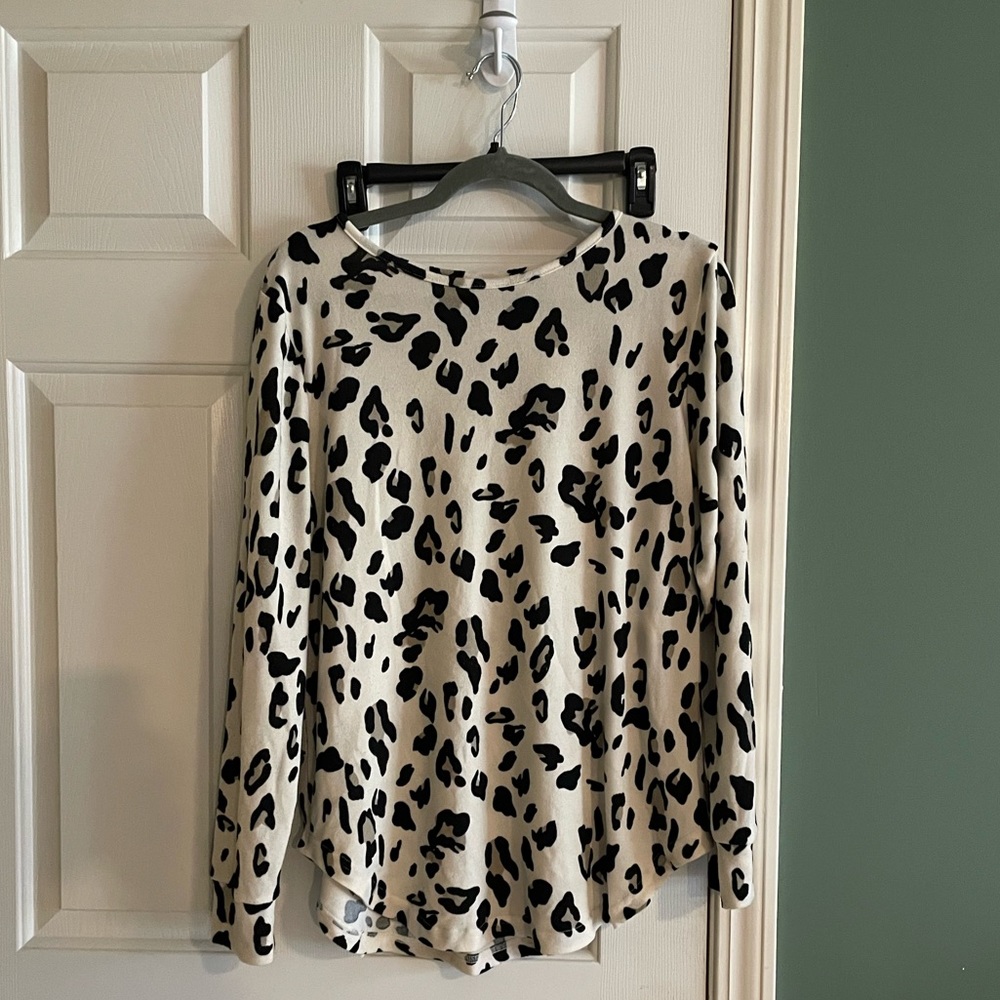 Soft cheetah print sweater. Tickled Teal